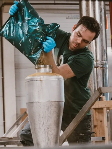 Image of Moersleutel Craft Brewery in Alkmaar A Brewer Adding Hops