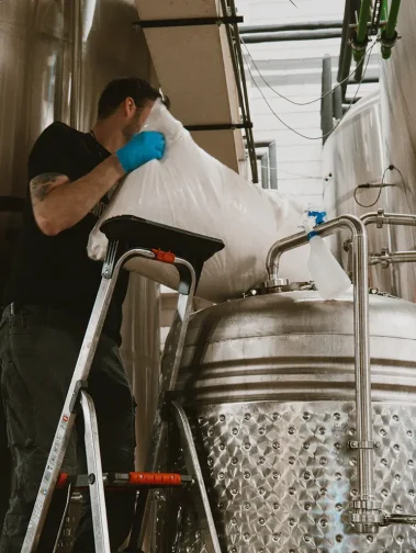 Image of Moersleutel Craft Brewery in Alkmaar A Brewer Adding Coffee