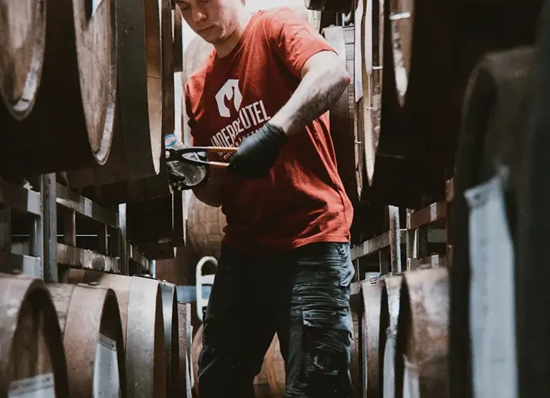 Rob at the Moersleutel Craft Brewery barrels in Alkmaar – creating craft beer for any occasion