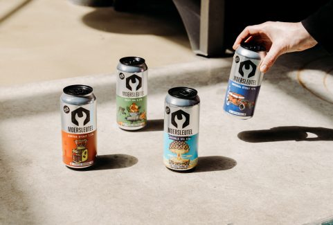 Moersleutel craft beer cans, including Coffee Stout, Hazy IPA, Double IPA and Imperial Stout