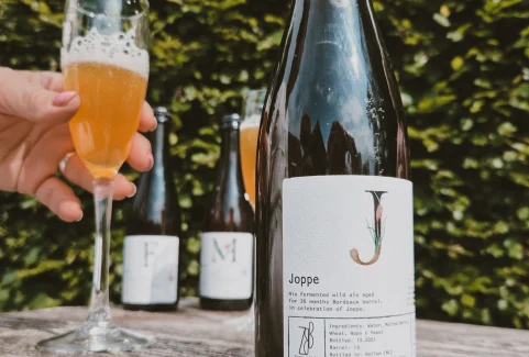 Wild ale Joppe from Zomerdijk Brewing & Blending with poured glass, part of the 9Y Summer Release